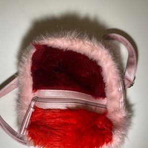 Fury multi colored mini book bag